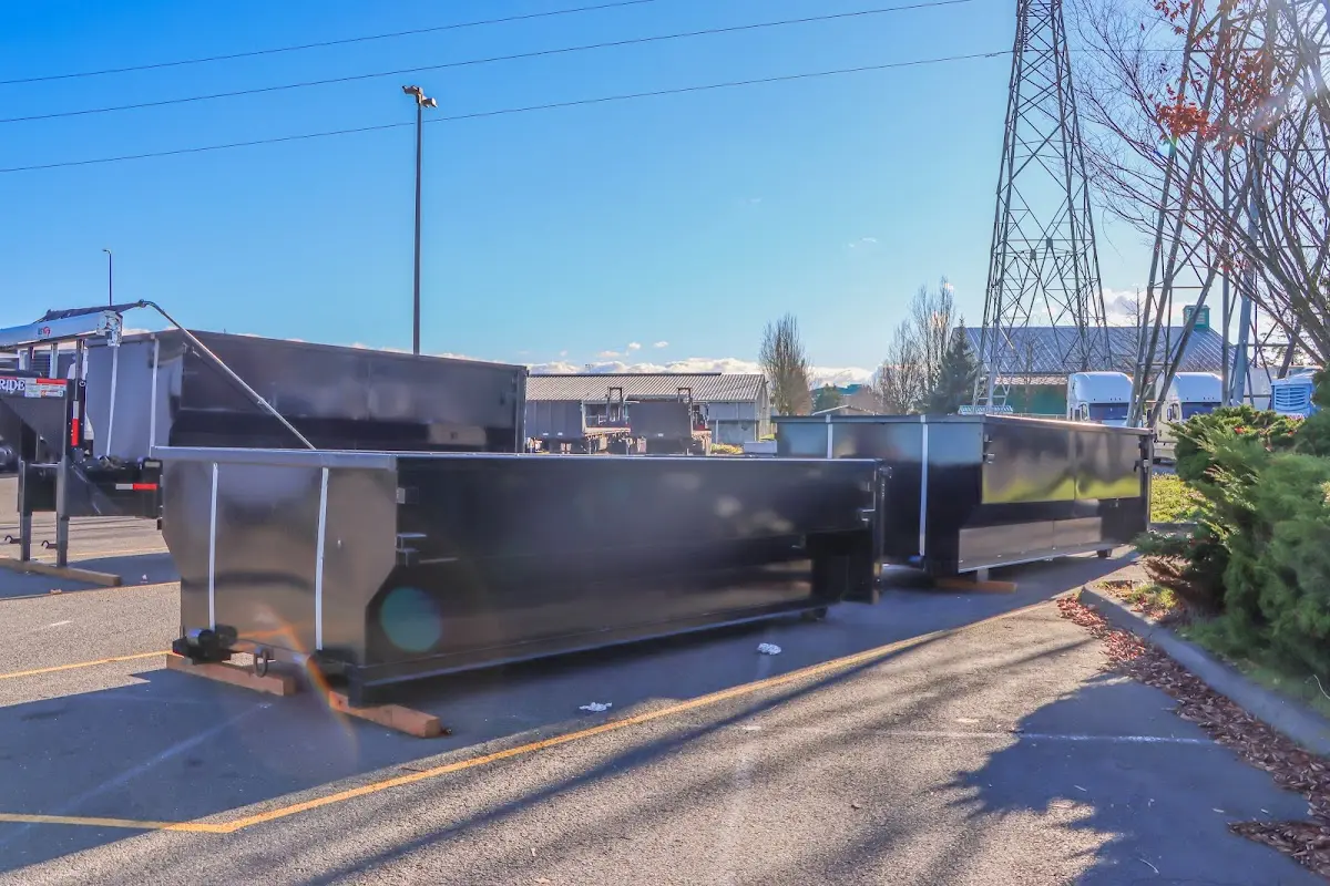 Roll-off dumpster ready for waste disposal at job site for Yard Waste Dumpster Rental in Loudon